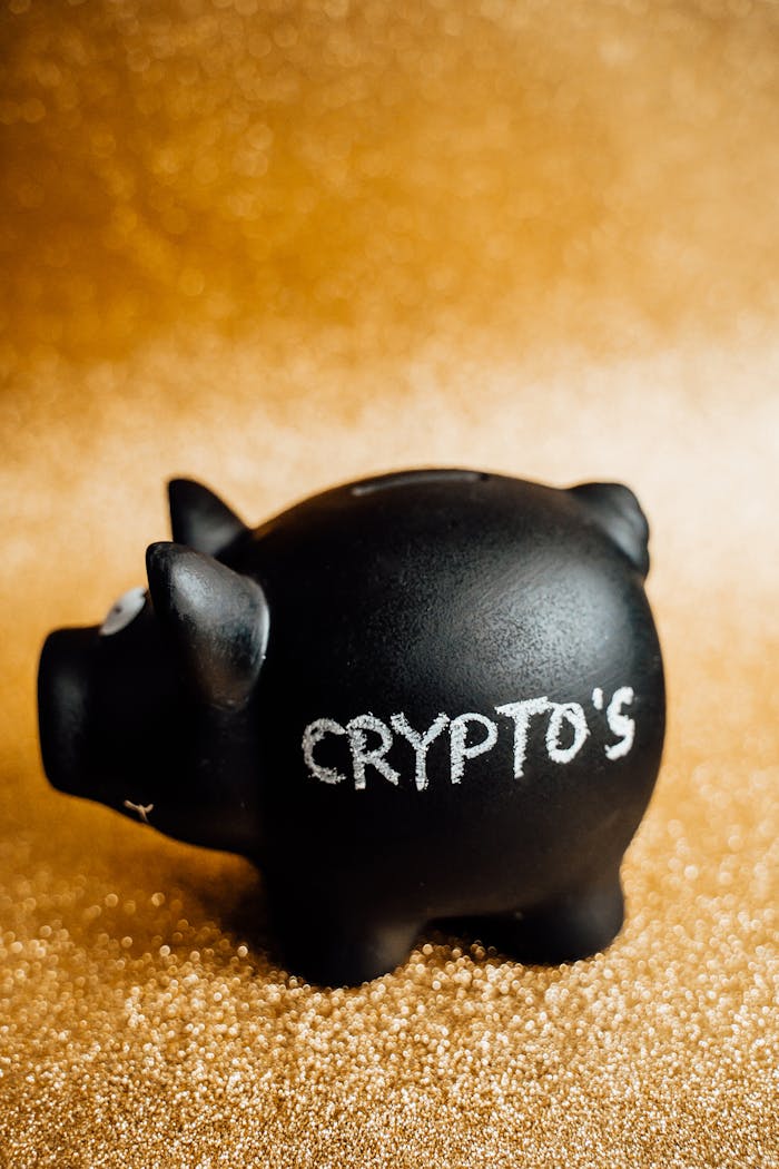 why-choose-us Black piggy bank labeled 'Crypto's' against a sparkling gold backdrop, symbolizing digital investment savings.